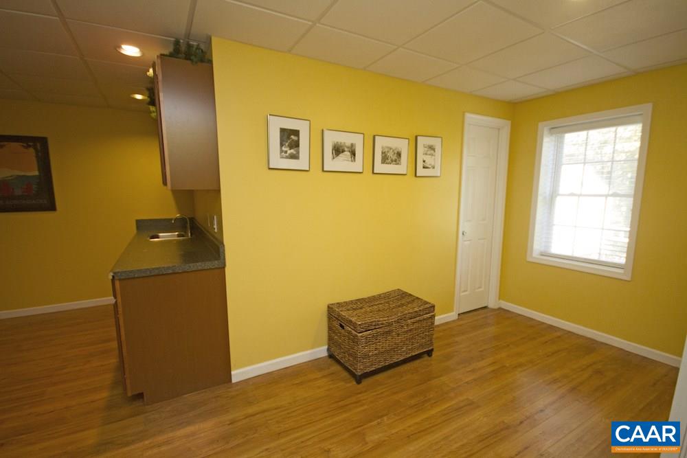 81 Hords Hill Road Ruckersville, VA 22968 - Photo 28 of 34 a room with a wooden floor and a window