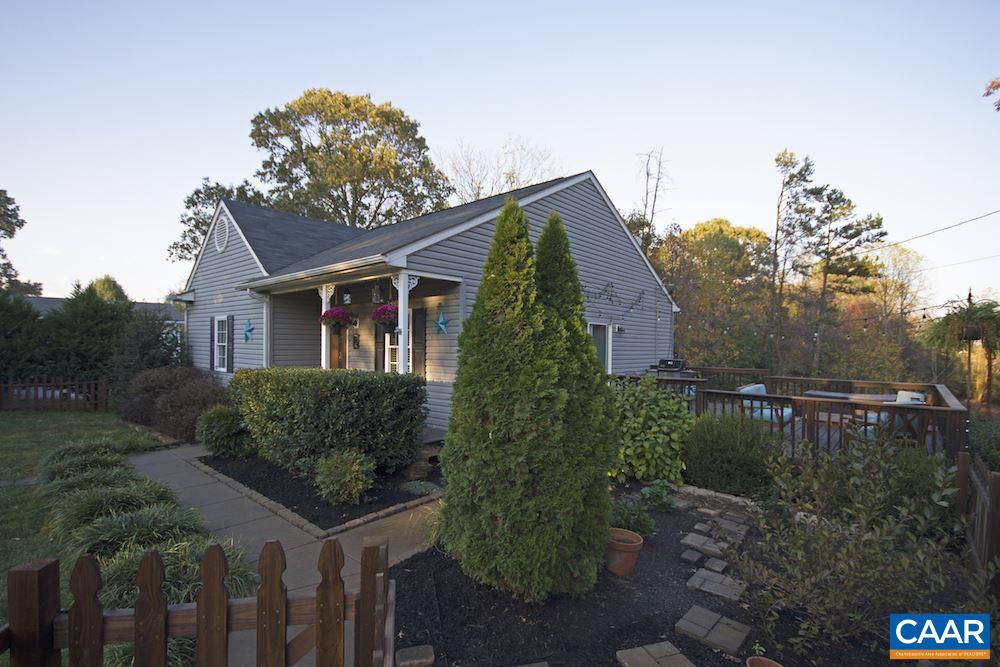 81 Hords Hill Road Ruckersville, VA 22968 - Photo 30 of 34 a front view of a house with a garden