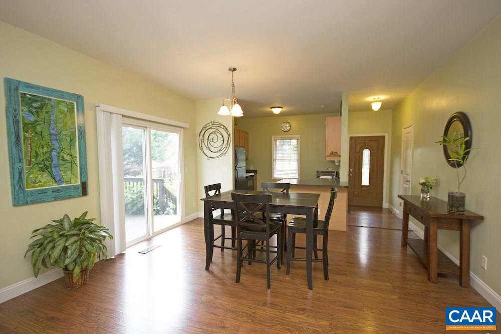 81 Hords Hill Road Ruckersville, VA 22968 - Photo 4 of 34 a view of a a dining room with furniture window and wooden floor