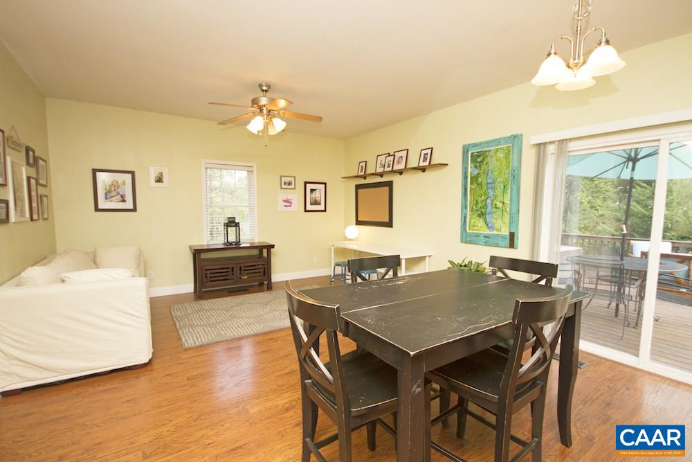 81 Hords Hill Road Ruckersville, VA 22968 - Photo 6 of 34 a view of a dining room with furniture and wooden floor