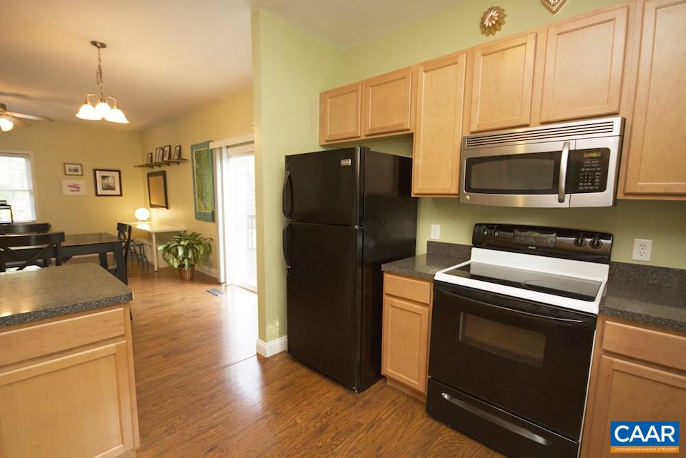 81 Hords Hill Road Ruckersville, VA 22968 - Photo 8 of 34 a kitchen with a refrigerator stove and microwave