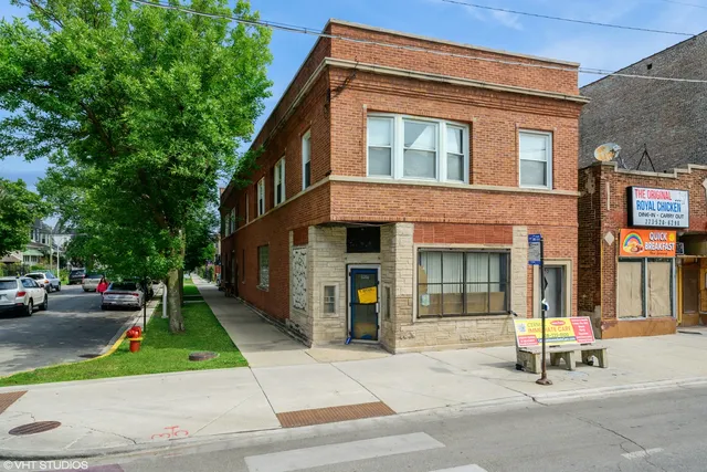 a bench sitting in front of a building