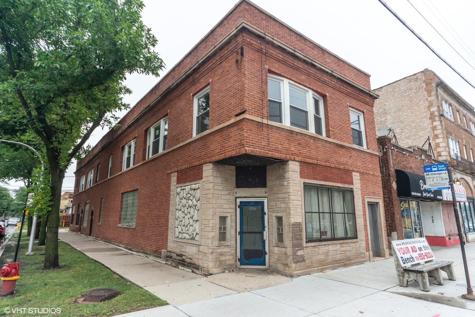 5256 West Chicago Avenue Chicago, IL 60651 - Photo 5 of 11 a front view of a house with a garden