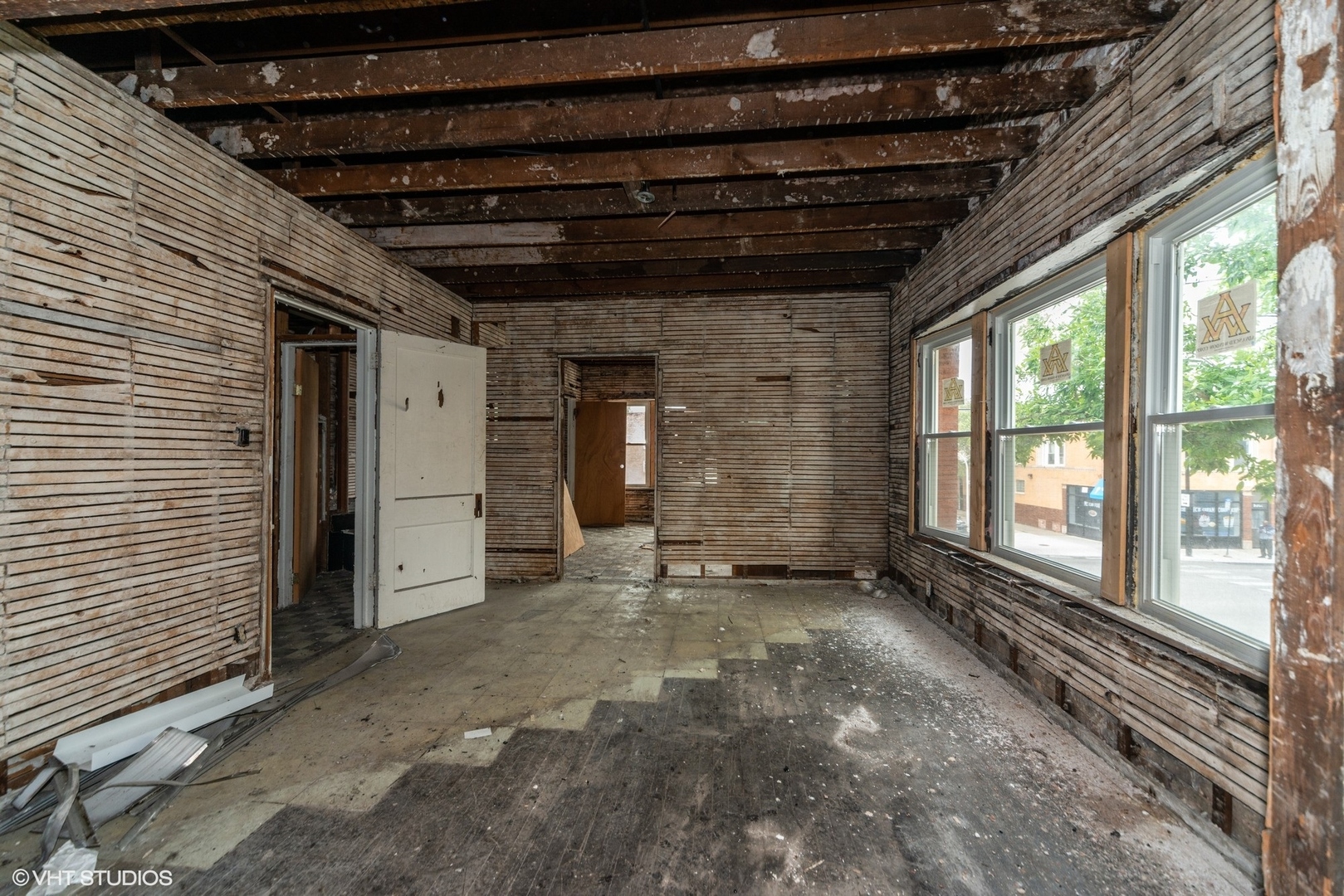 5256 West Chicago Avenue Chicago, IL 60651 - Photo 7 of 11 a view of a room with wooden floor and windows
