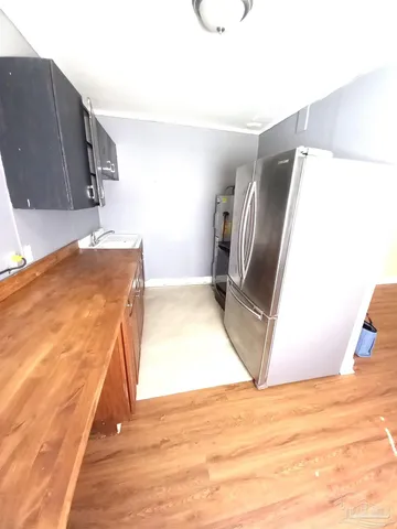 a view of kitchen and utility room