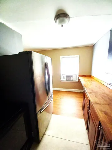 a view of a kitchen with a sink and a dishwasher