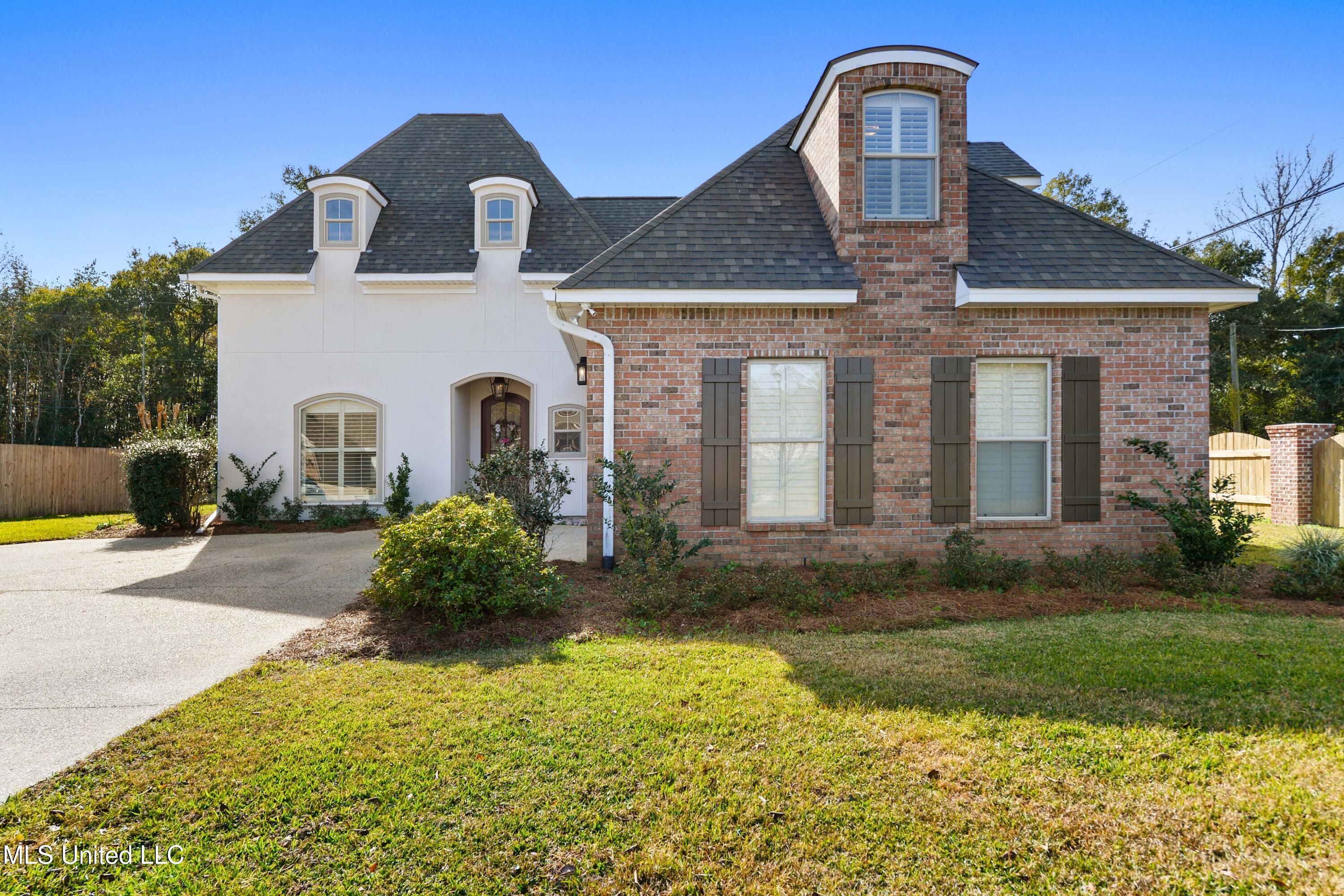 4 Rue Orleans Court Long Beach, MS 39560 - Photo 2 of 28 Landscaped Lot