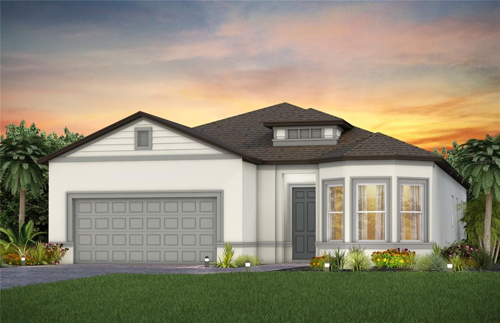 a front view of a house with a yard and pathway