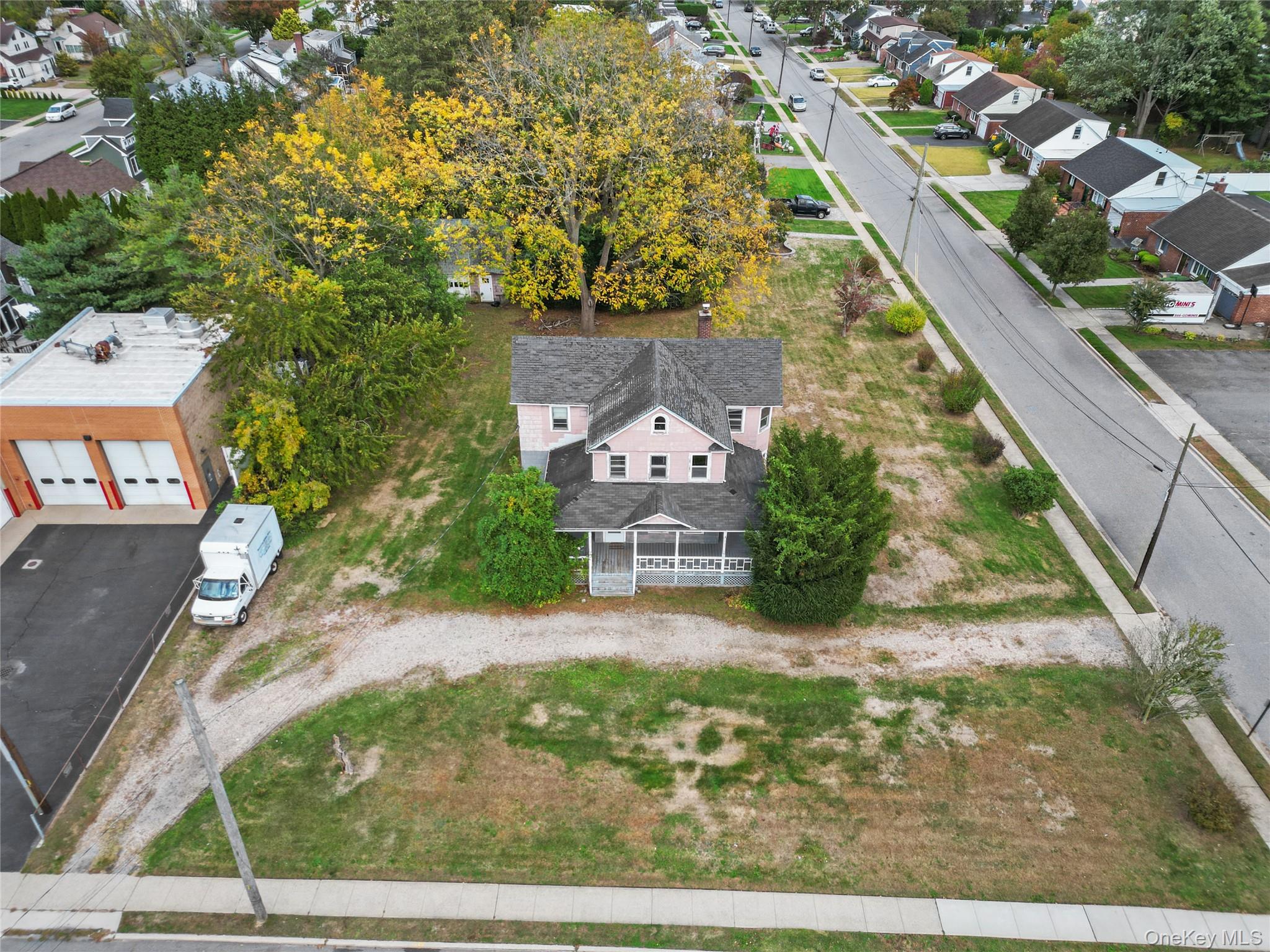 135 Merritts Road Farmingdale, NY 11735 - Photo 1 of 1 an aerial view of a house