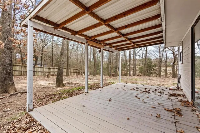 a view of a house with a yard and garage