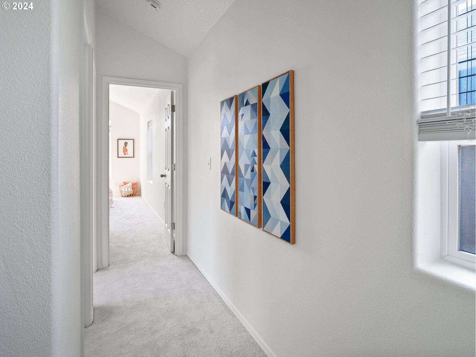 5541 Southeast Henderson Street Portland, OR 97206 - Photo 14 of 26 a view of a hallway with windows and closet