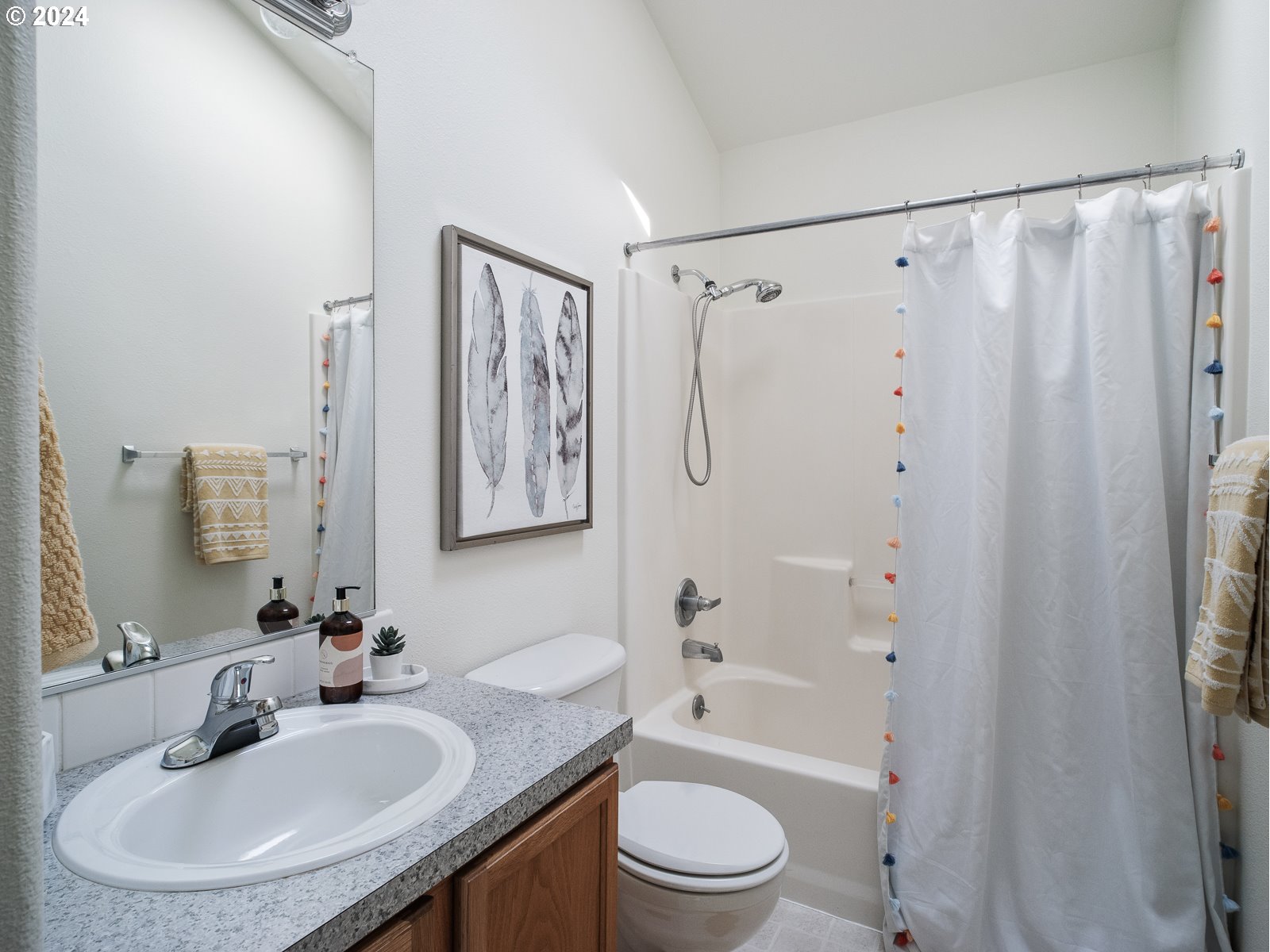 5541 Southeast Henderson Street Portland, OR 97206 - Photo 15 of 26 a bathroom with a sink toilet a shower and a mirror