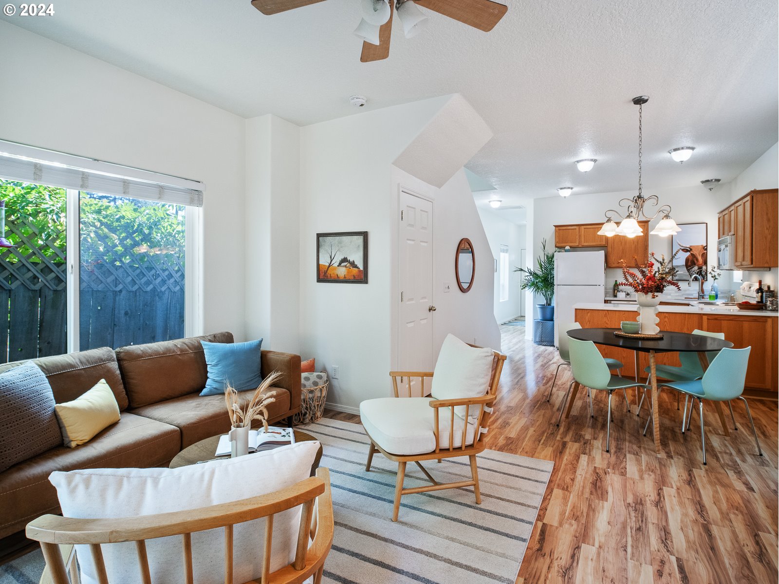 5541 Southeast Henderson Street Portland, OR 97206 - Photo 4 of 26 a living room with furniture and wooden floor