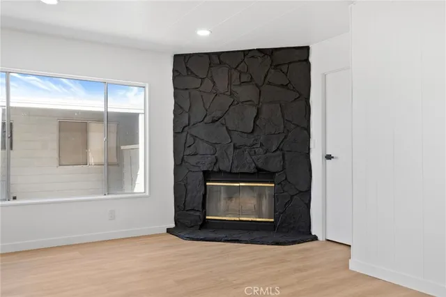 a view of cabinets and wooden floor