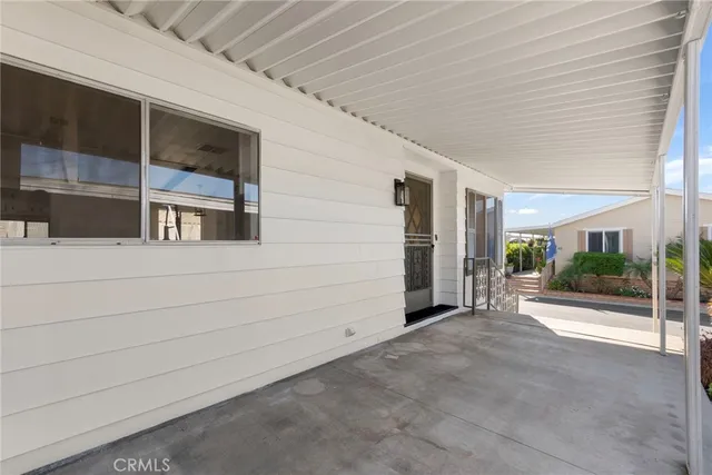 an aerial view of a house with a swimming pool