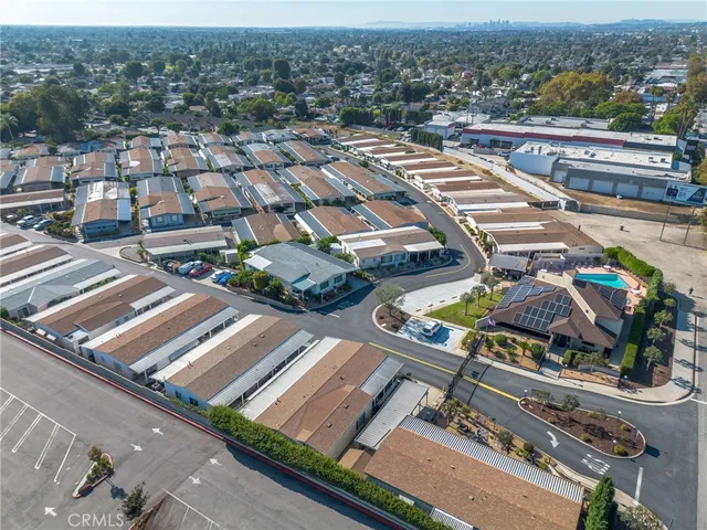 an aerial view of a house with a garden and entryway