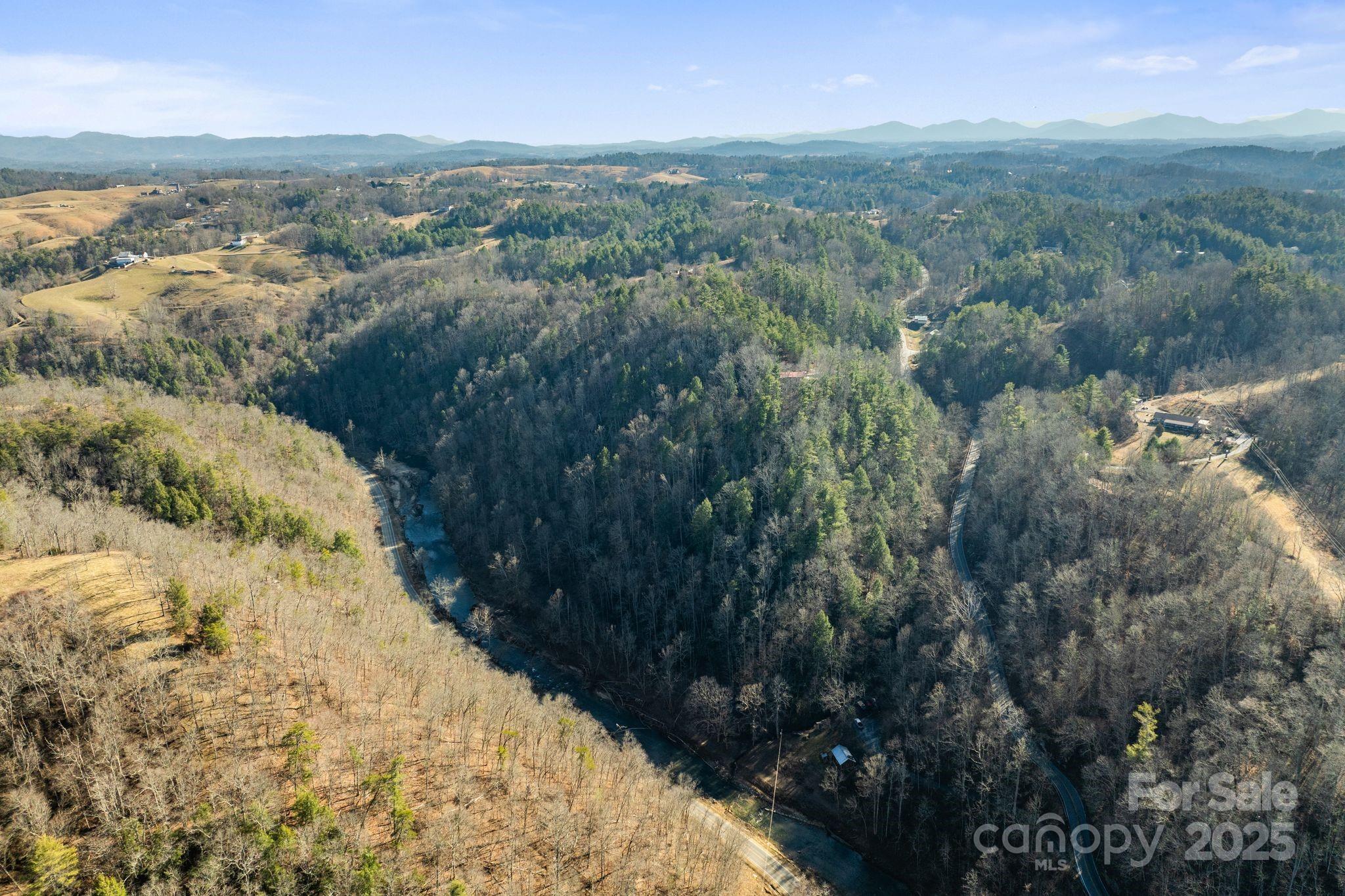 131 Ivy Blfs Road, Unit 3 Marshall, NC 28753 - Photo 12 of 24 a view of city and mountain