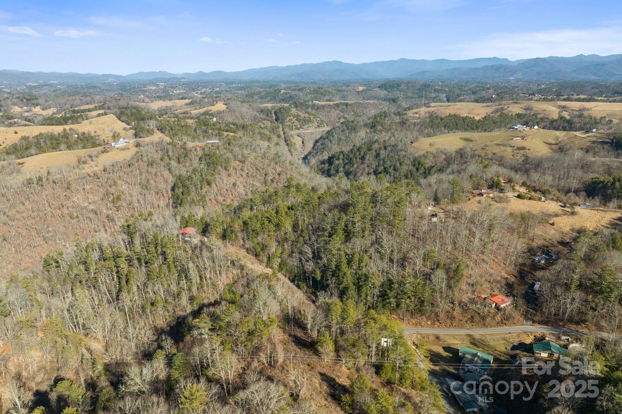 131 Ivy Blfs Road, Unit 3 Marshall, NC 28753 - Photo 15 of 24 a view of lake and mountain