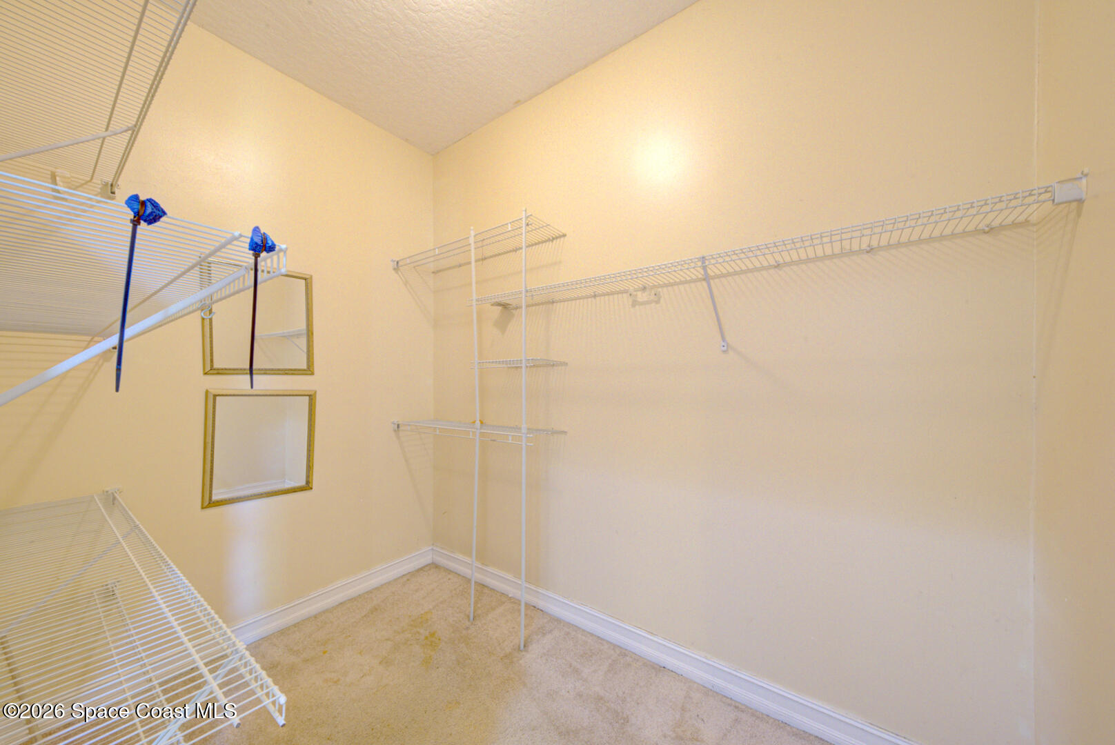 1090 Castile Road Southeast Palm Bay, FL 32909 - Photo 17 of 22 primary bedroom closet