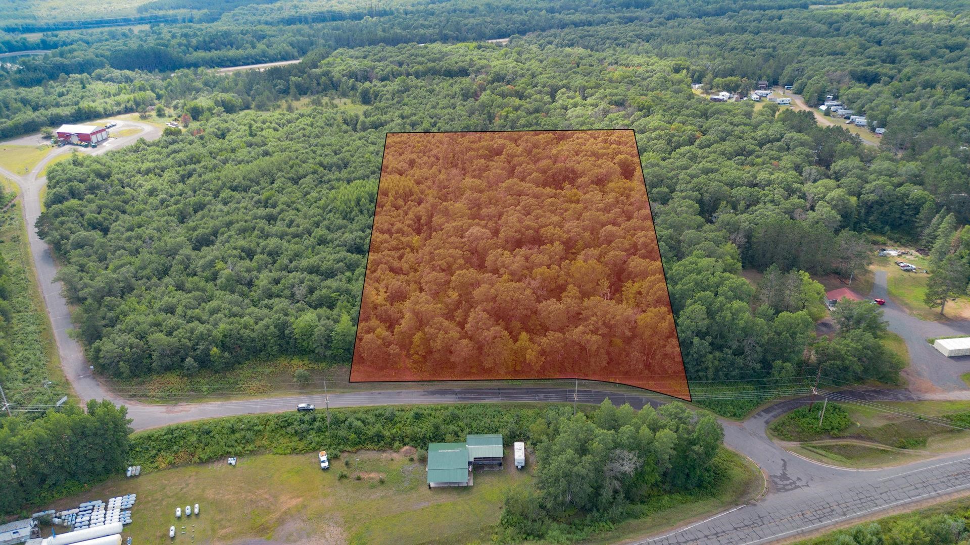11857 South Holly Lucius Road Solon Springs, WI 54873 - Photo 4 of 8 View of property location with property boundaries highlighted and a heavily wooded area