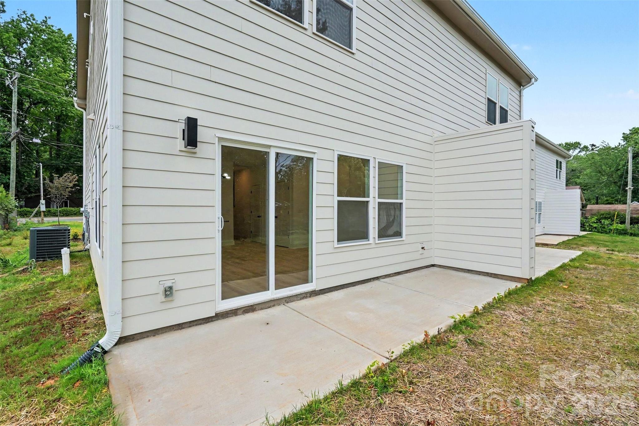 7521 Lawyers Road Charlotte, NC 28227 - Photo 32 of 35 a view of a house with a backyard