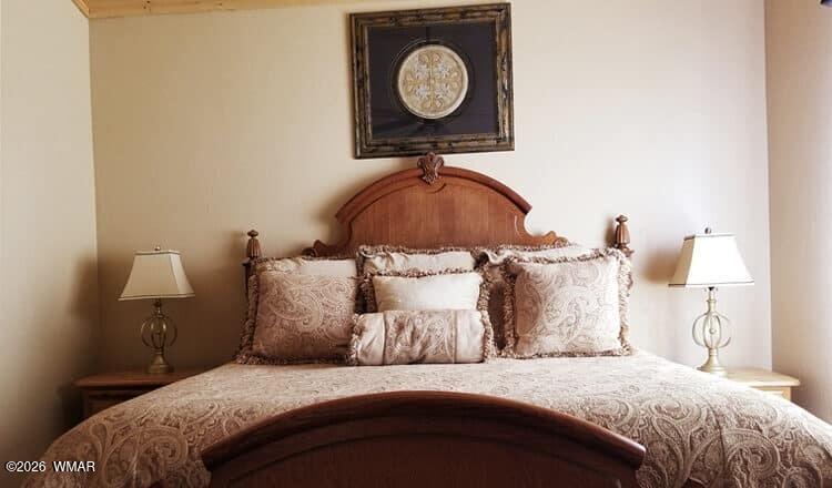 285 Main Street Eagar, AZ 85925 - Photo 11 of 18 a bedroom with a bed and a closet in it