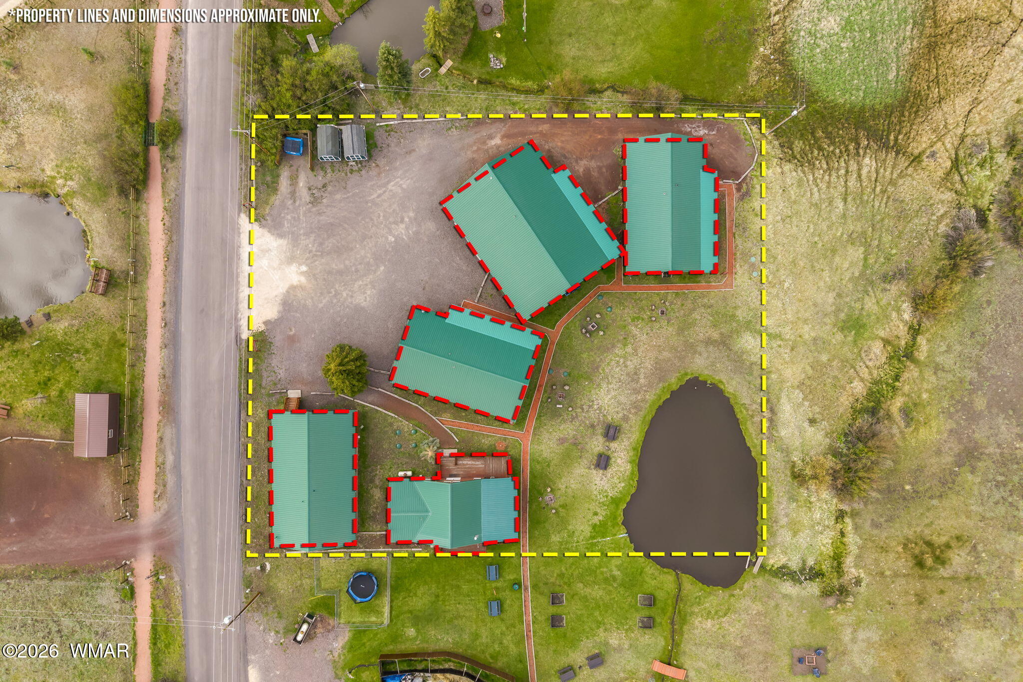 285 Main Street Eagar, AZ 85925 - Photo 17 of 18 an aerial view of a house with a yard and trees
