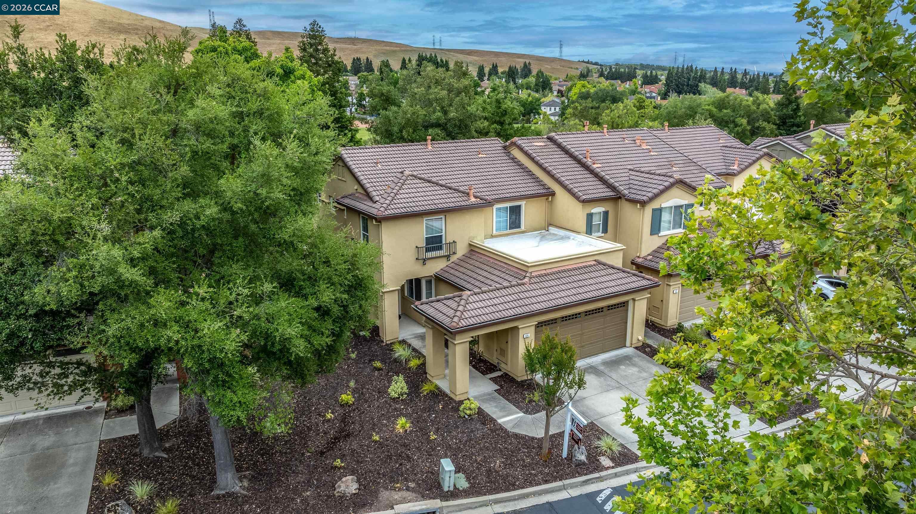 124 Coralflower Lane San Ramon, CA 94582 - Photo 41 of 47 a aerial view of a house with a big yard plants and large trees