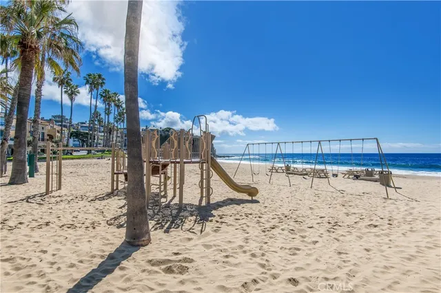 a view of a swimming pool with a bench