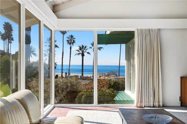 a view of a living room and window