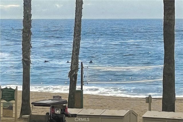 a balcony with a bench and painted walls