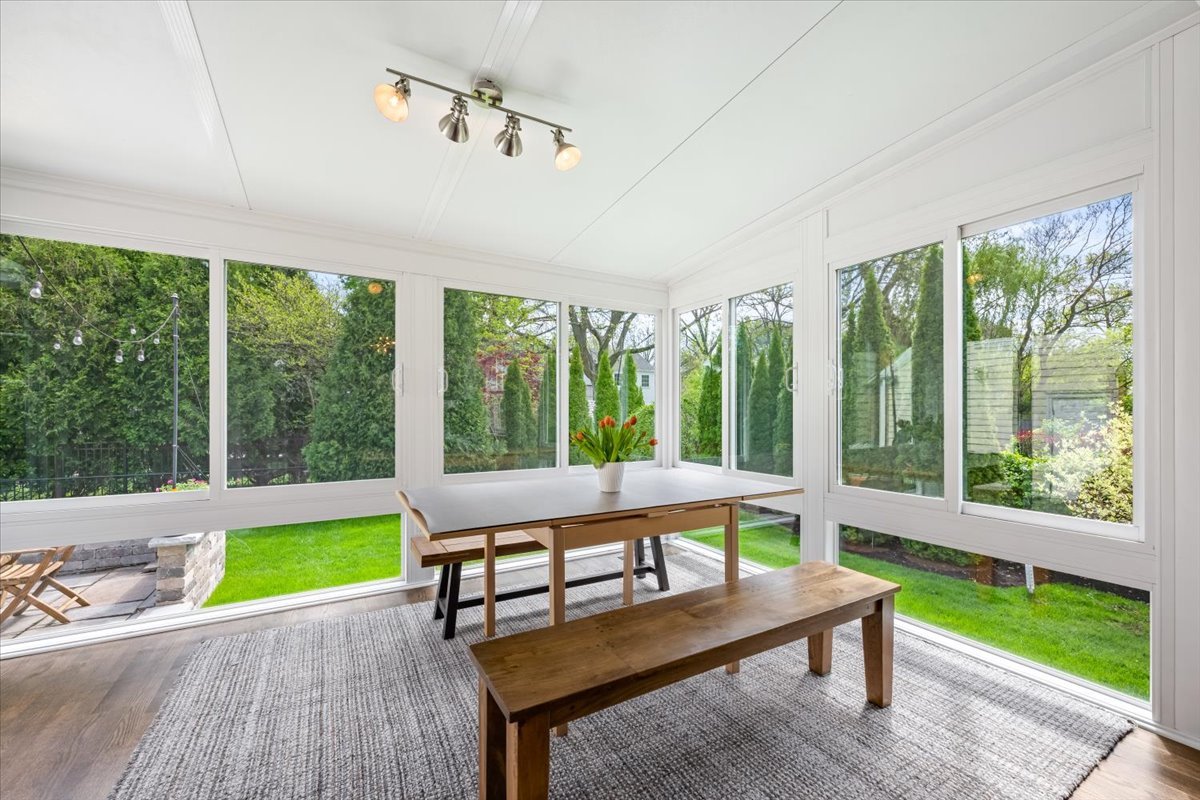 910 Chippewa Lane Wilmette, IL 60091 - Photo 16 of 38 a wooden bench sitting in the middle of a room