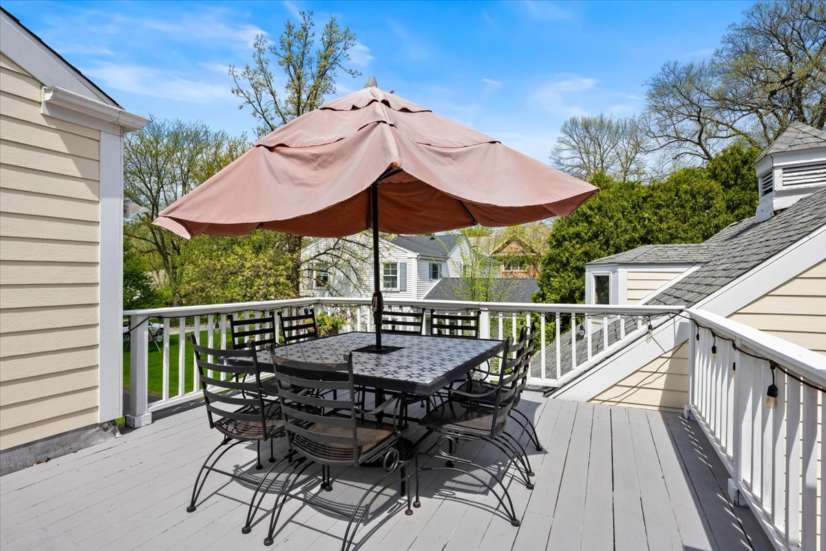 910 Chippewa Lane Wilmette, IL 60091 - Photo 21 of 38 a view of balcony with furniture and umbrella