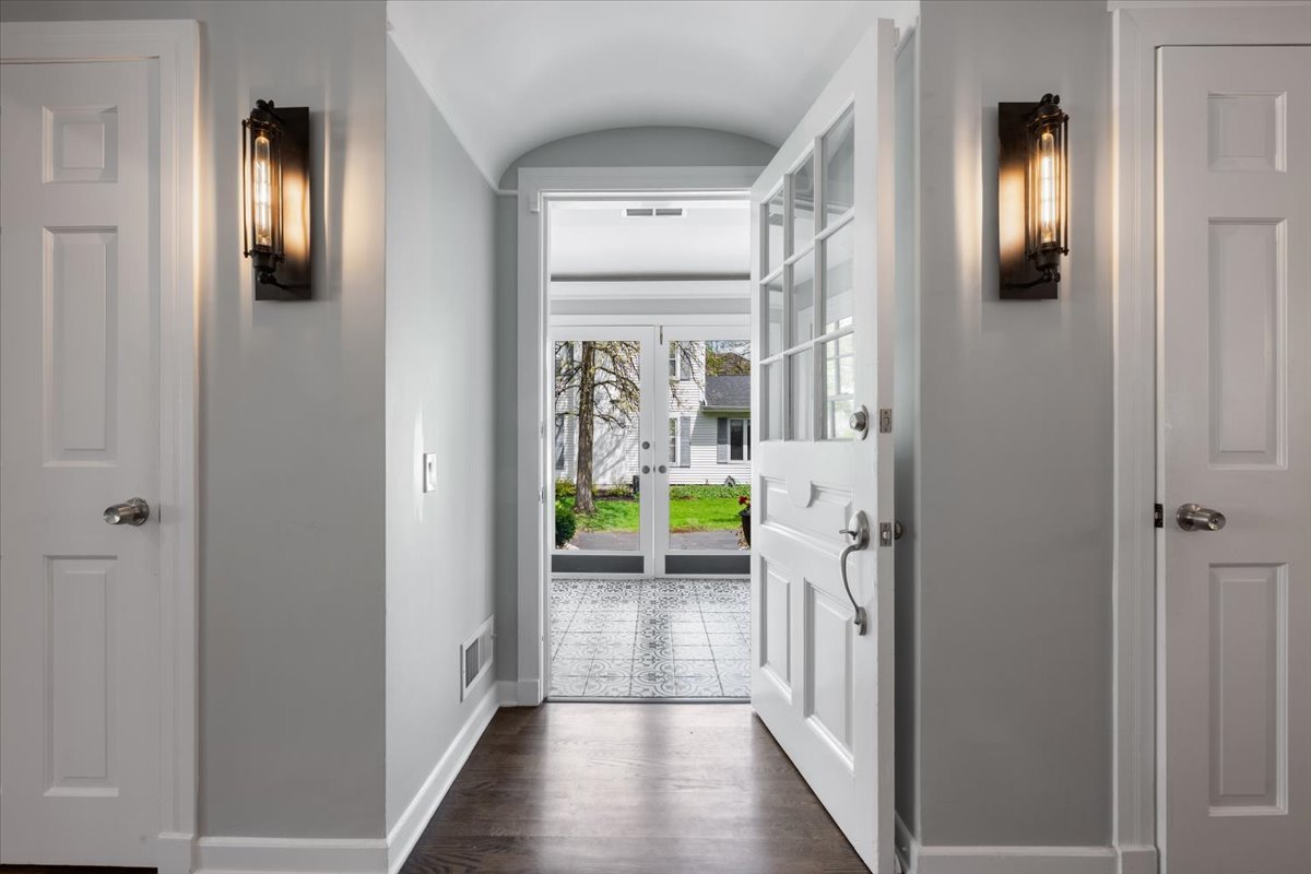 910 Chippewa Lane Wilmette, IL 60091 - Photo 3 of 38 a view of hallway with stairs and wooden floor