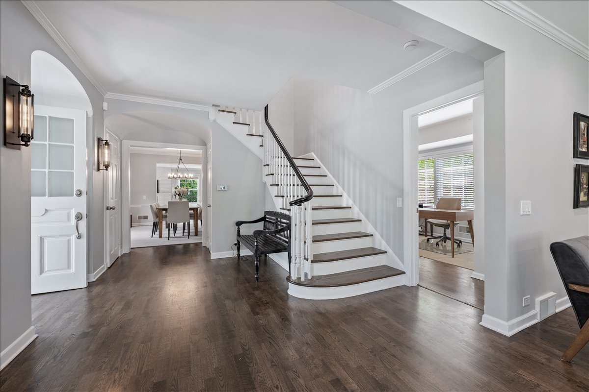 910 Chippewa Lane Wilmette, IL 60091 - Photo 5 of 38 a view of entryway with wooden floor and stairs