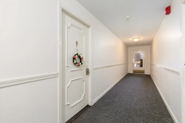 a view of a hallway with hallway