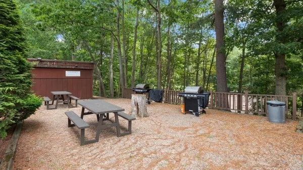 a view of a chairs and tables in the patio