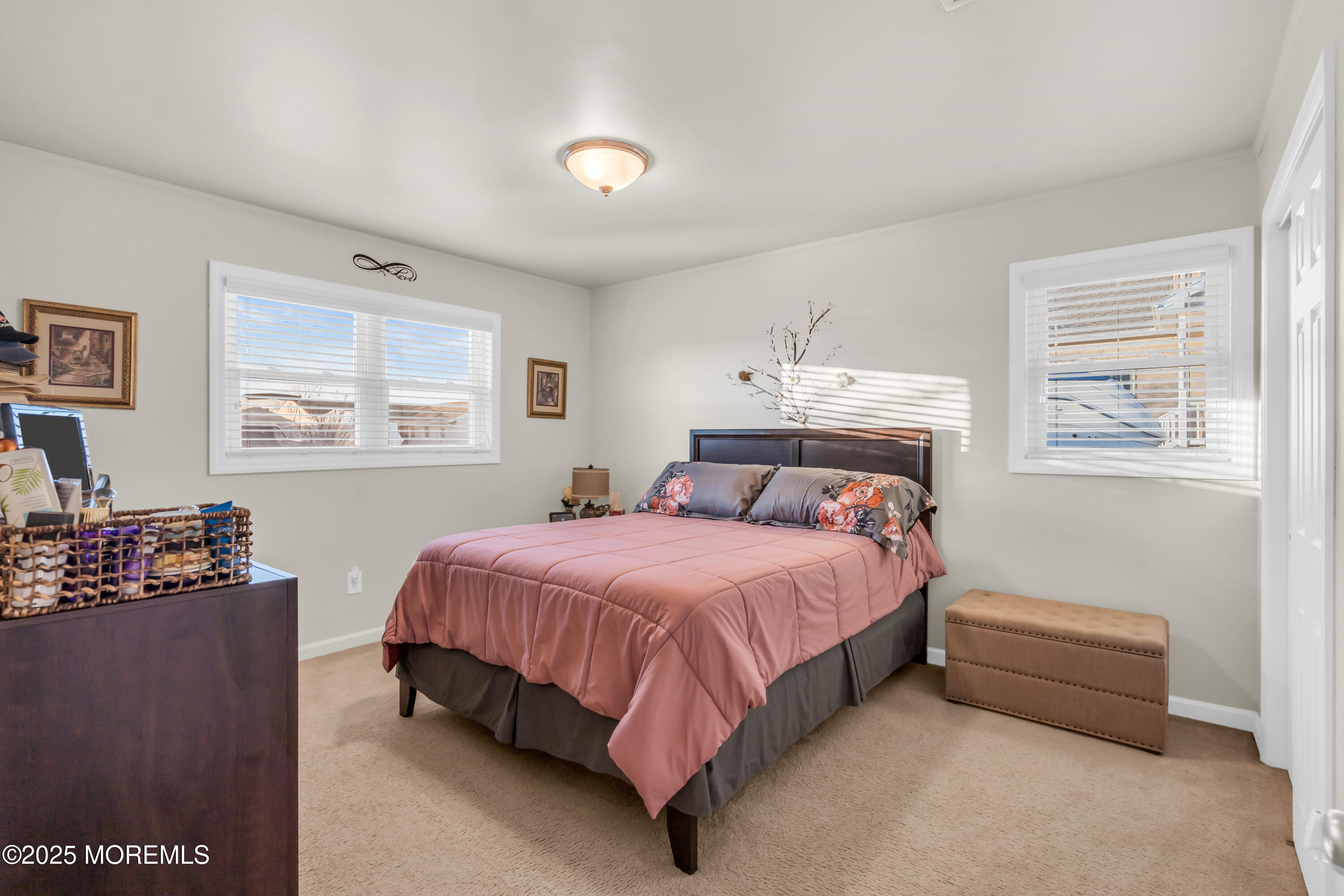 230 Montclair Road South Barnegat, NJ 08005 - Photo 19 of 28 a spacious bedroom with a bed and wooden floor