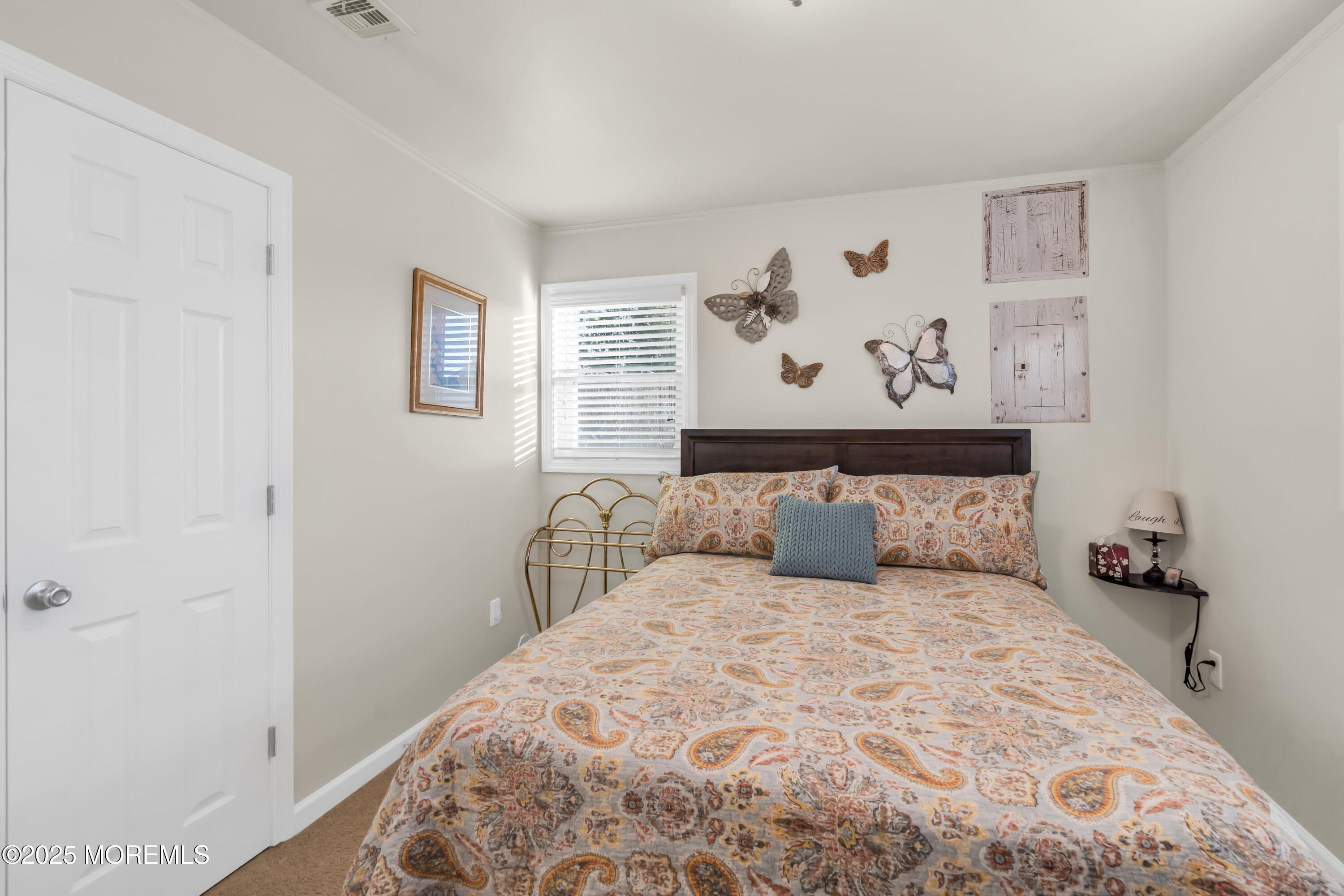 230 Montclair Road South Barnegat, NJ 08005 - Photo 20 of 28 a bedroom with a bed and wall painting