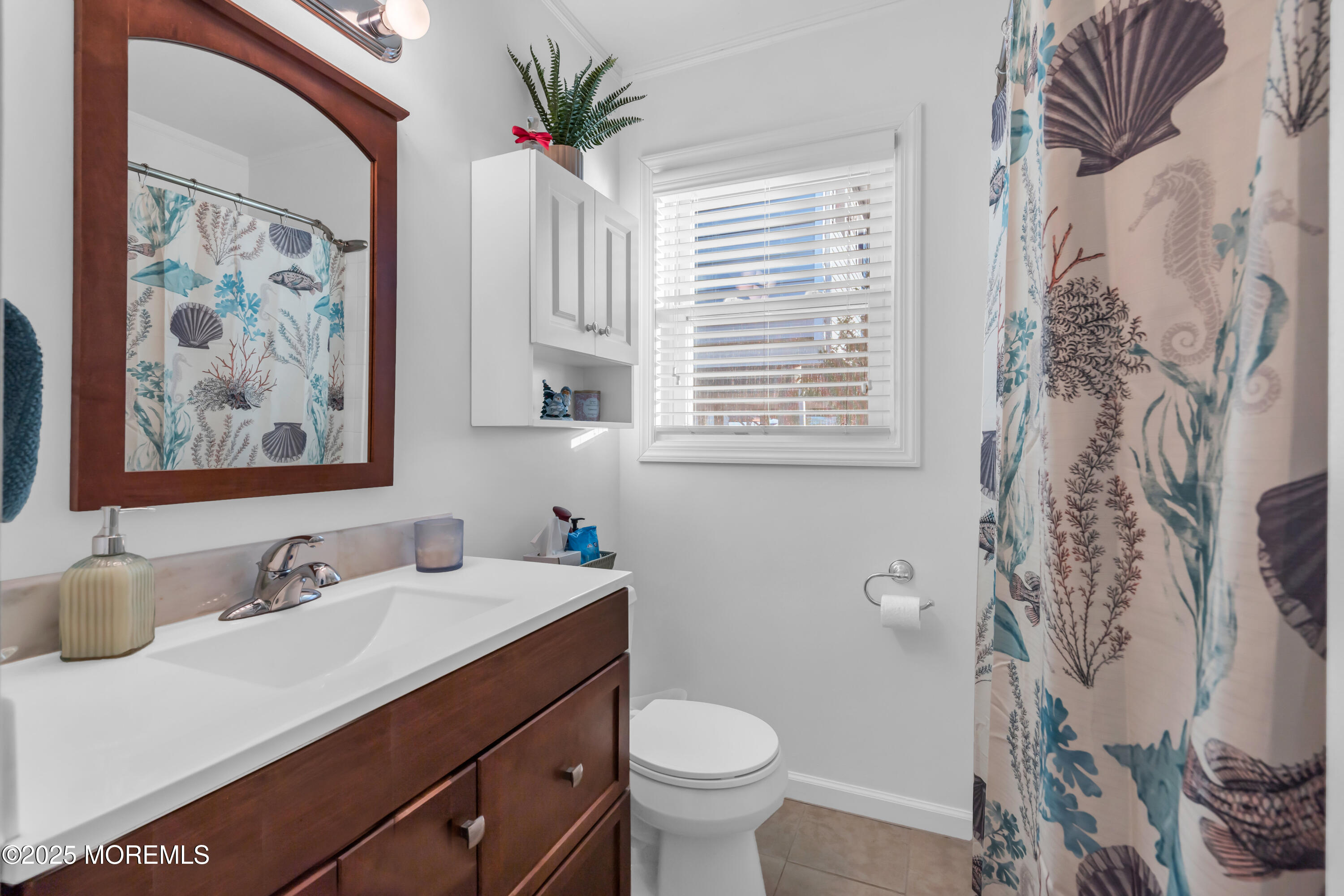230 Montclair Road South Barnegat, NJ 08005 - Photo 22 of 28 a bathroom with a sink toilet and a window