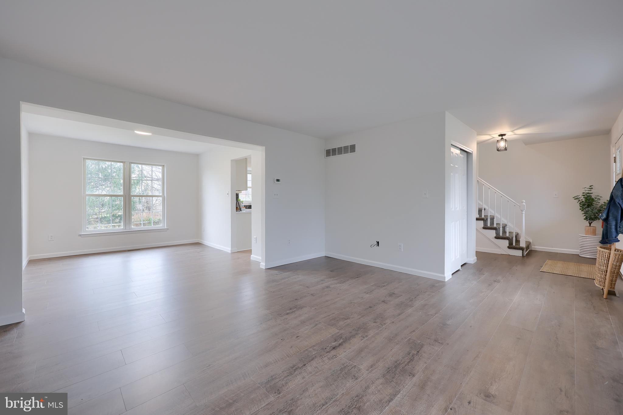 40 Gunpowder Lane Reading, PA 19606 - Photo 11 of 59 an empty room with wooden floor and windows