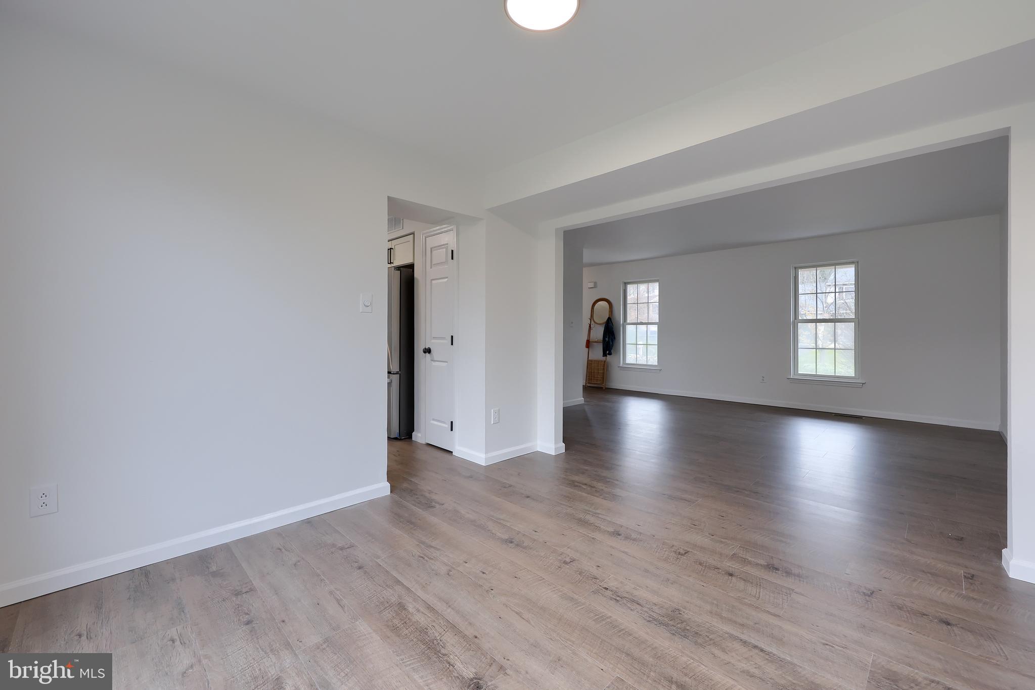 40 Gunpowder Lane Reading, PA 19606 - Photo 14 of 59 an empty room with wooden floor and windows