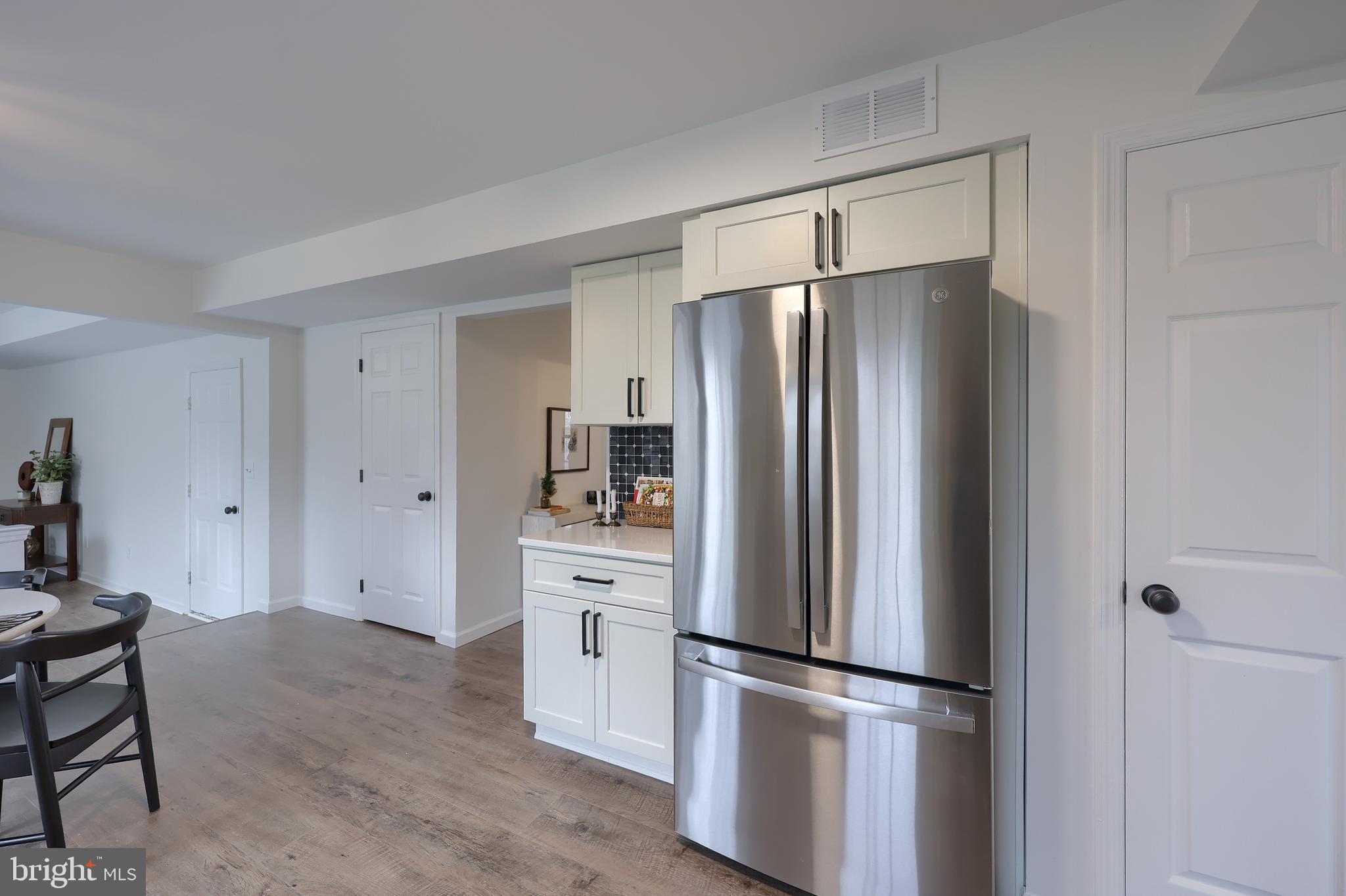 40 Gunpowder Lane Reading, PA 19606 - Photo 19 of 59 a kitchen with stainless steel appliances a refrigerator and a stove top oven