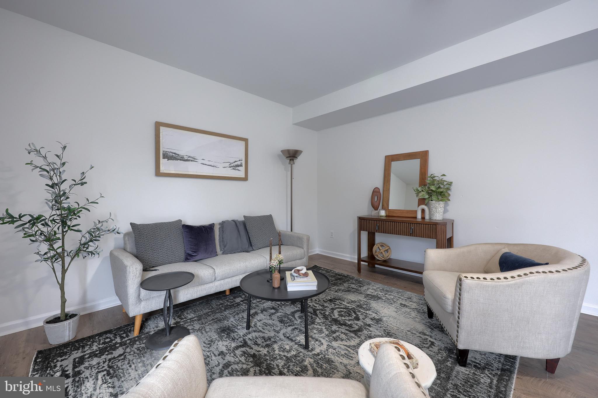 40 Gunpowder Lane Reading, PA 19606 - Photo 26 of 59 a living room with furniture and a potted plant
