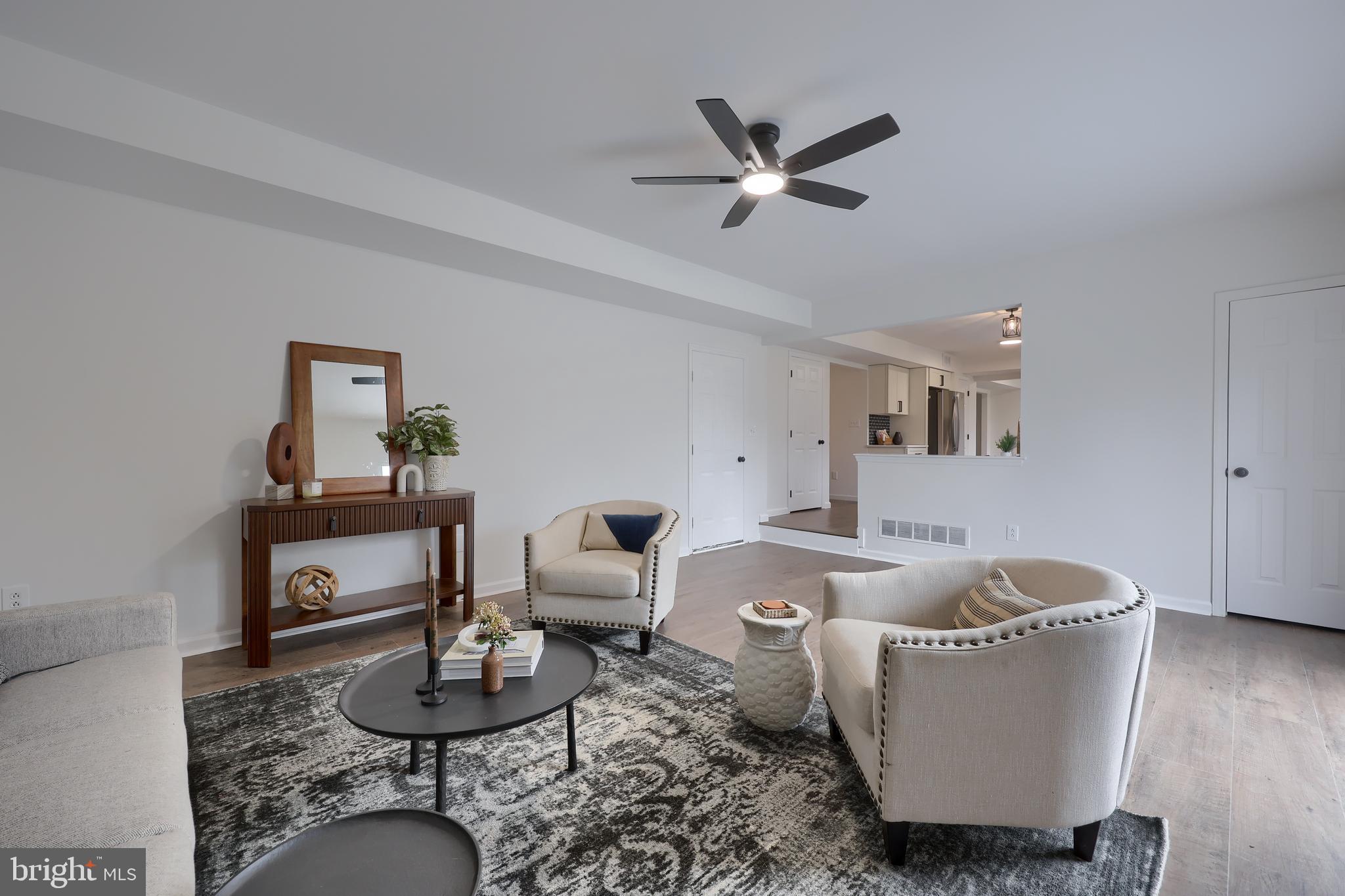 40 Gunpowder Lane Reading, PA 19606 - Photo 27 of 59 a living room with furniture and a wooden floor