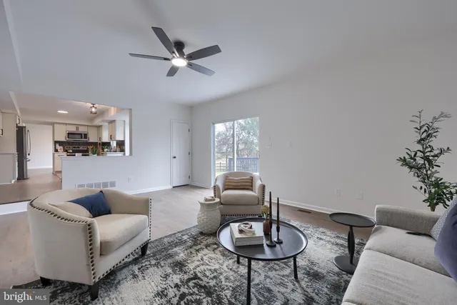 a bedroom with a large bed and a couch