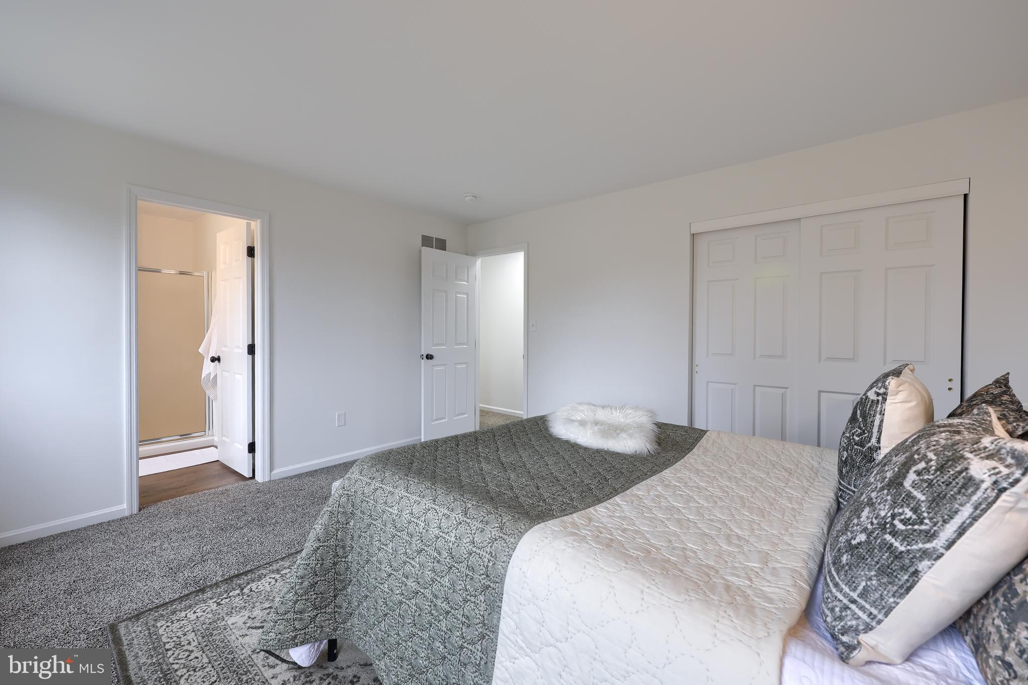 40 Gunpowder Lane Reading, PA 19606 - Photo 30 of 59 a bedroom with a large bed and a couch