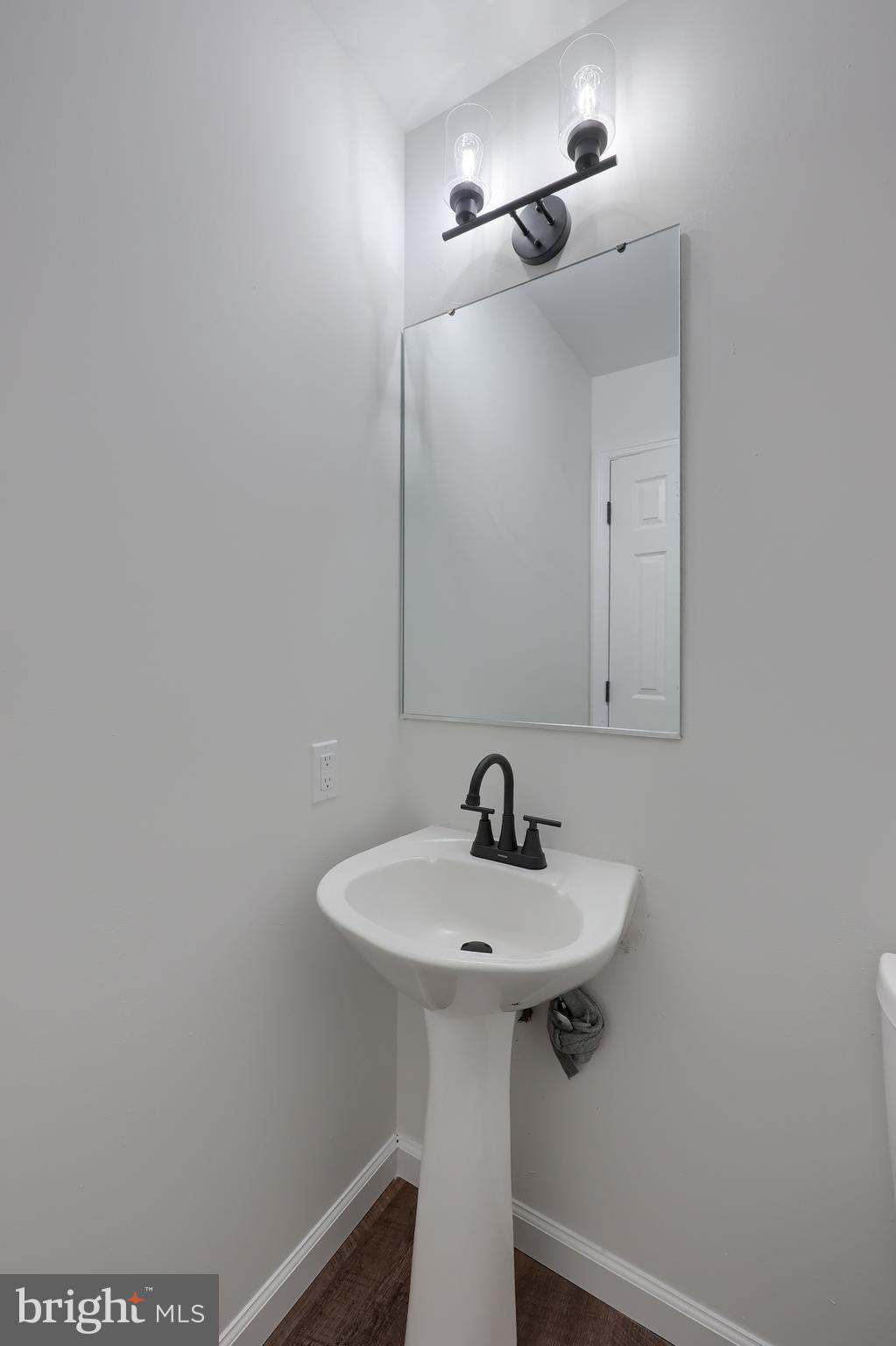 40 Gunpowder Lane Reading, PA 19606 - Photo 32 of 59 a bathroom with a sink and mirror