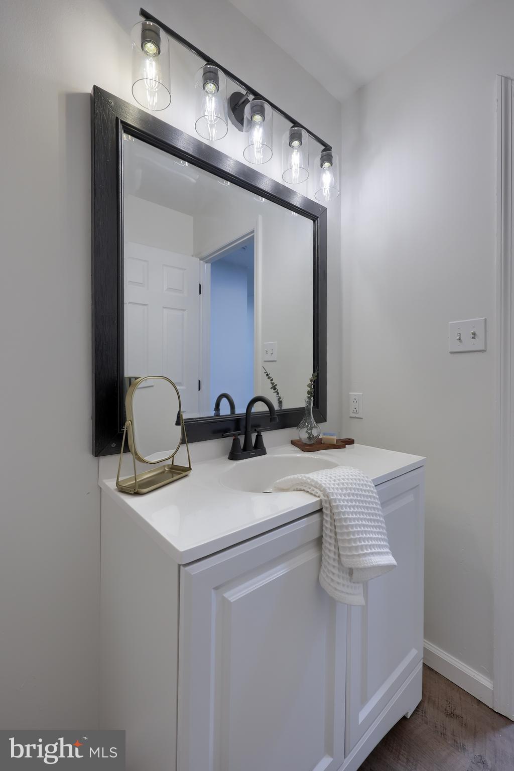 40 Gunpowder Lane Reading, PA 19606 - Photo 37 of 59 a bathroom with a sink and a mirror
