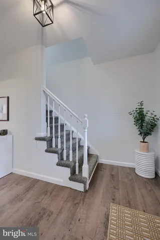 a view of entryway with wooden floor